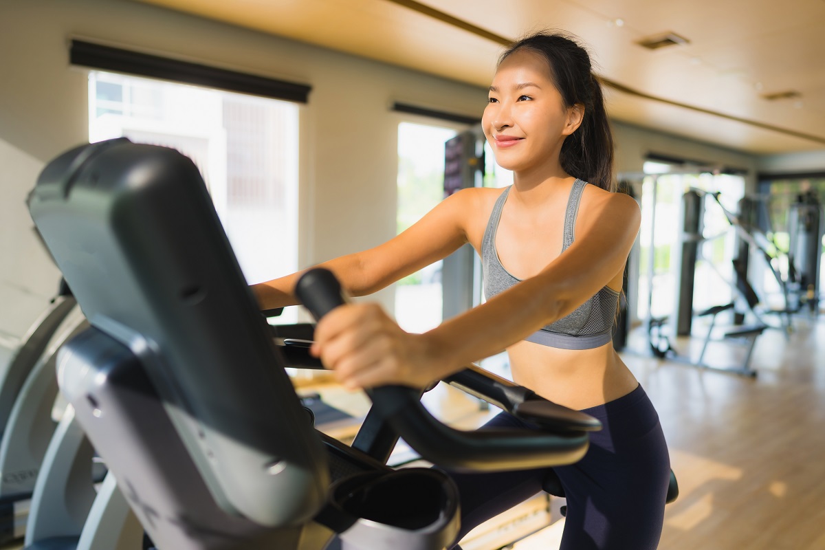 Portrait asian woman exercising and work out in gym