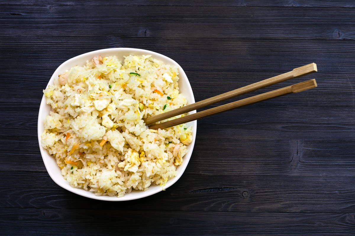 top view of portion of Fried Rice with chopsticks
